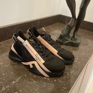 Flow mid-top sneaker from Fendi. They are brand new and have never been worn